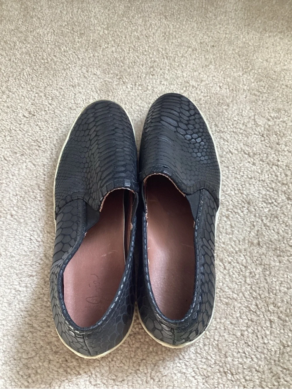 Joie Kidmore Slip-On Sneaker in a black snake-embossed leather